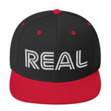 REAL By.. JA'NERIK The Brand Snapback Hat