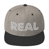 REAL By.. JA'NERIK The Brand Snapback Hat
