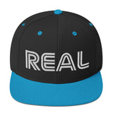 REAL By.. JA'NERIK The Brand Snapback Hat