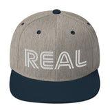 REAL By.. JA'NERIK The Brand Snapback Hat