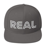 REAL By.. JA'NERIK The Brand Snapback Hat