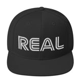 REAL By.. JA'NERIK The Brand Snapback Hat