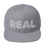 REAL By.. JA'NERIK The Brand Snapback Hat