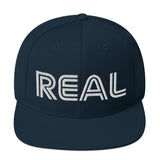 REAL By.. JA'NERIK The Brand Snapback Hat