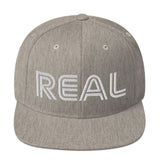 REAL By.. JA'NERIK The Brand Snapback Hat