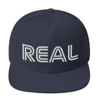 REAL By.. JA'NERIK The Brand Snapback Hat